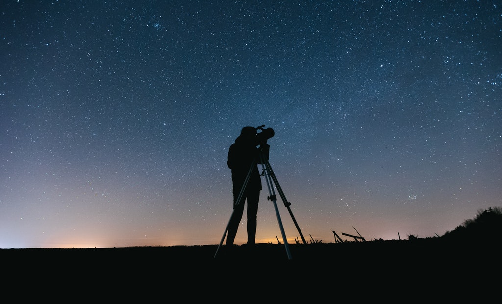 Silhouette Under Starry Night